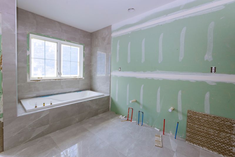 Contractor Installing Bathtub